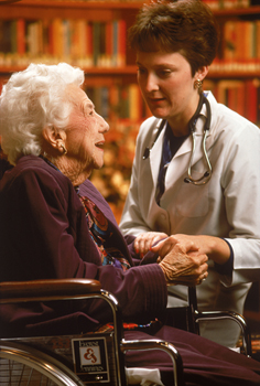 Lady in Wheel Chair and Nurse